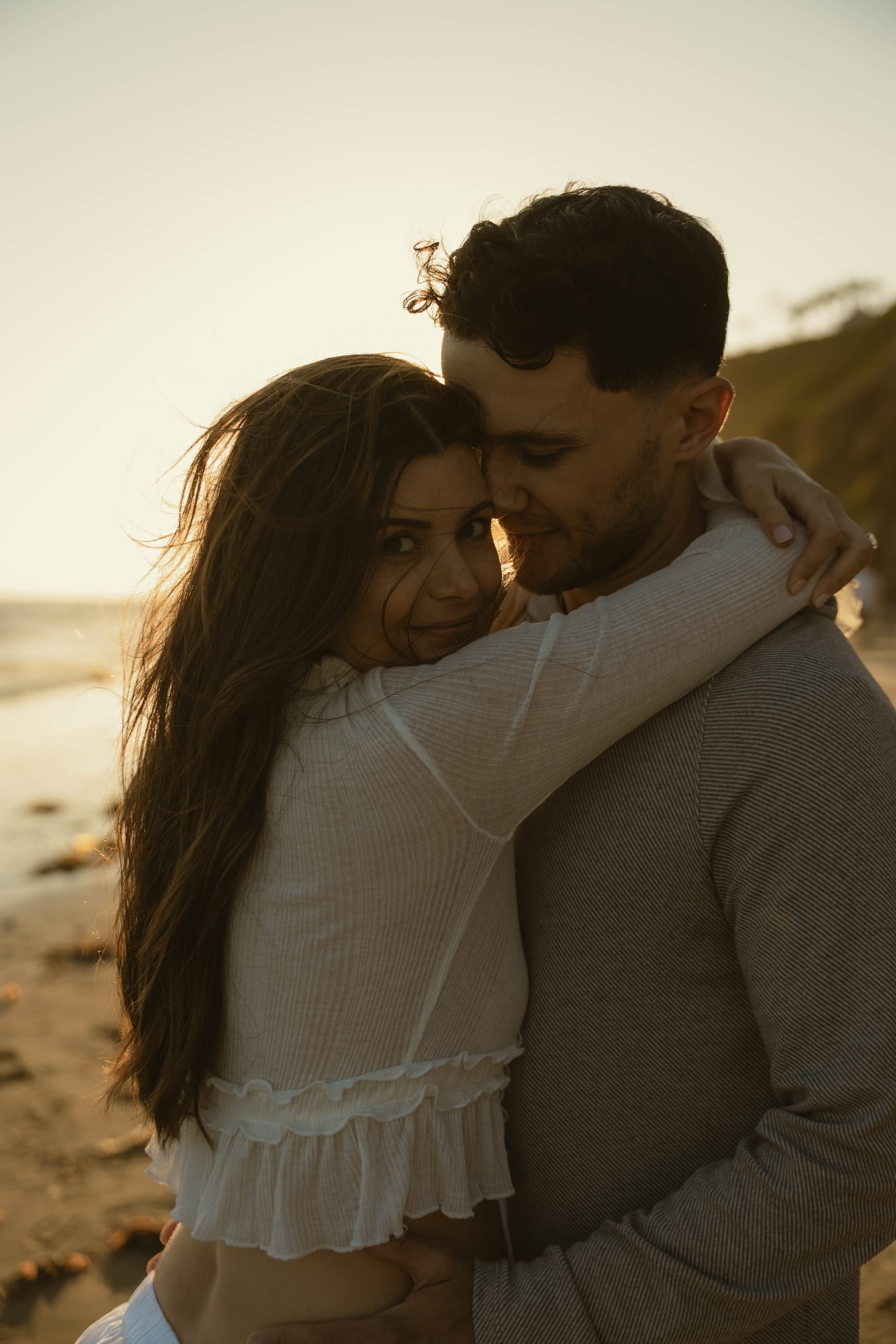A maternity couple session at sunset